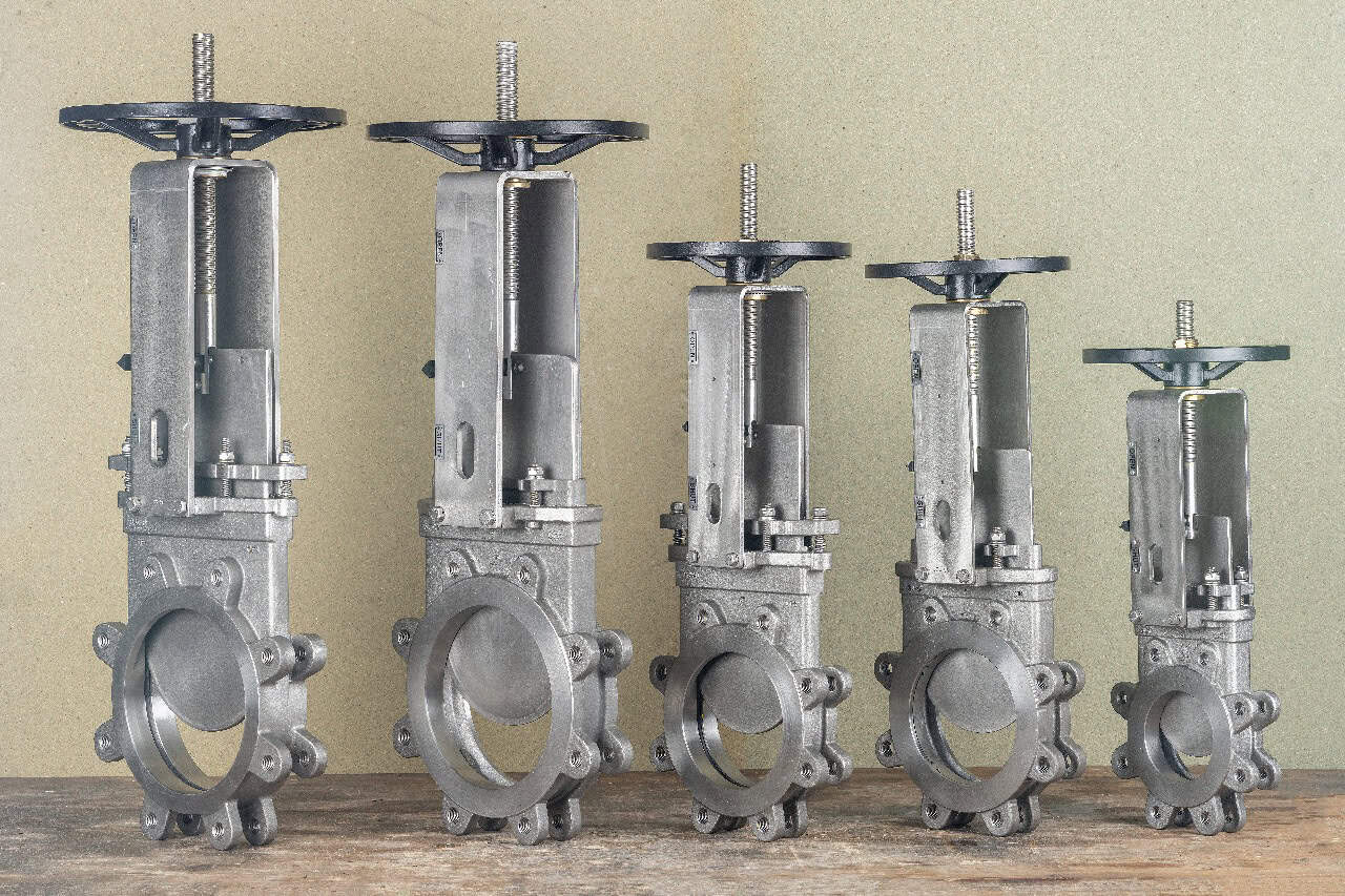 Range of stainless steel manual knife gate valves in multiple sizes for industrial flow control and shut-off applications.