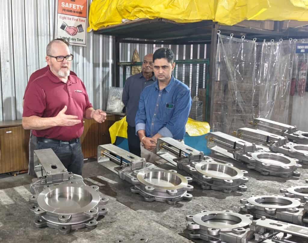 International client visit at UUNIQE Ventures manufacturing facility, reviewing precision-engineered knife gate valves during the final inspection and quality assessment process.