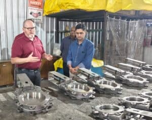 International client visit at UUNIQE Ventures manufacturing facility, reviewing precision-engineered knife gate valves during the final inspection and quality assessment process.